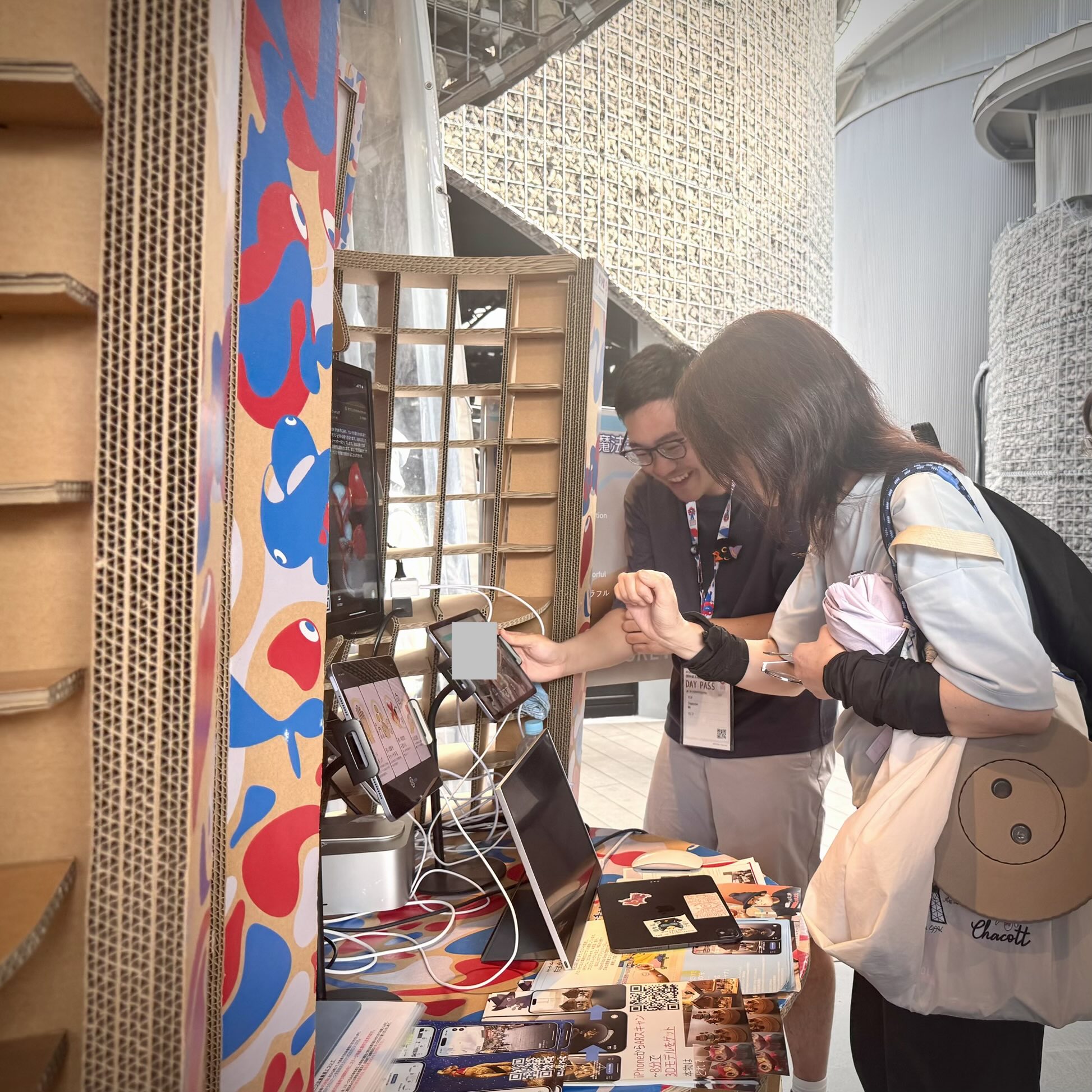 Visitors talking with me at the Expo booth.