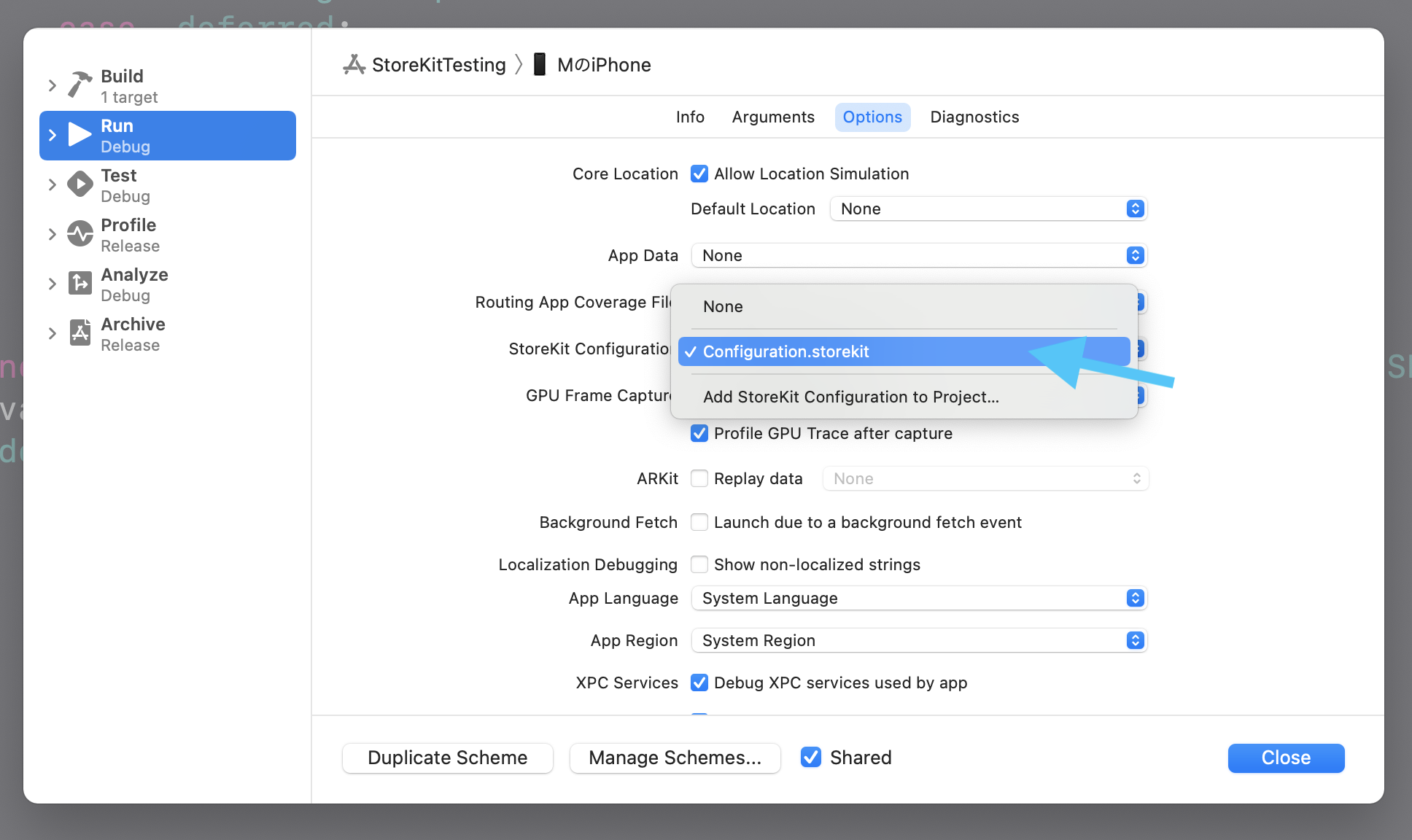 Xcode scheme editor showing a StoreKit Configuration file selected for local in-app purchase testing