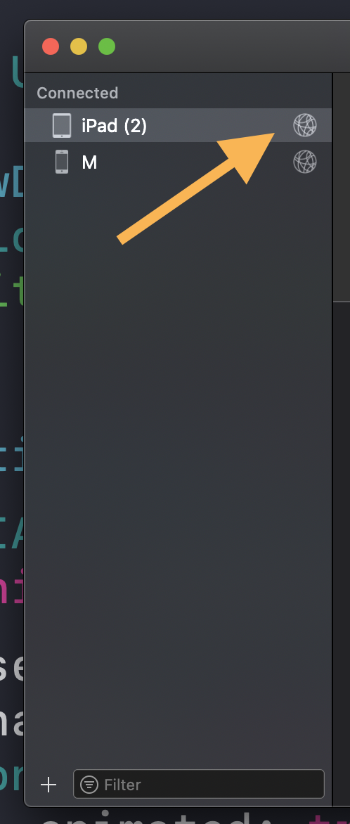 Physical iPhone listed in Xcode with a network icon indicating wireless connection